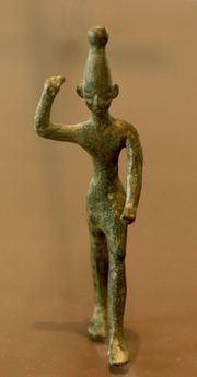 Ba`al with raised arm, 14th-12th century BC, found at Ras Shamra (ancient Ugarit), Louvre